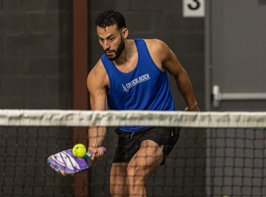Coach Zach playing pickleball
